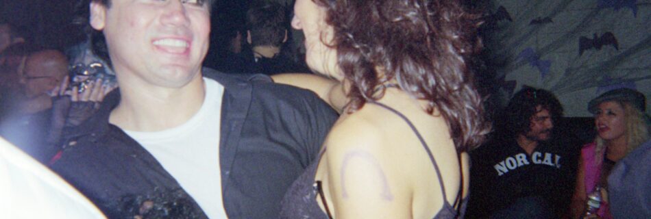 mike dressed as Robert Smith from the cure for halloween dancing with me at DNA Lounge in SF