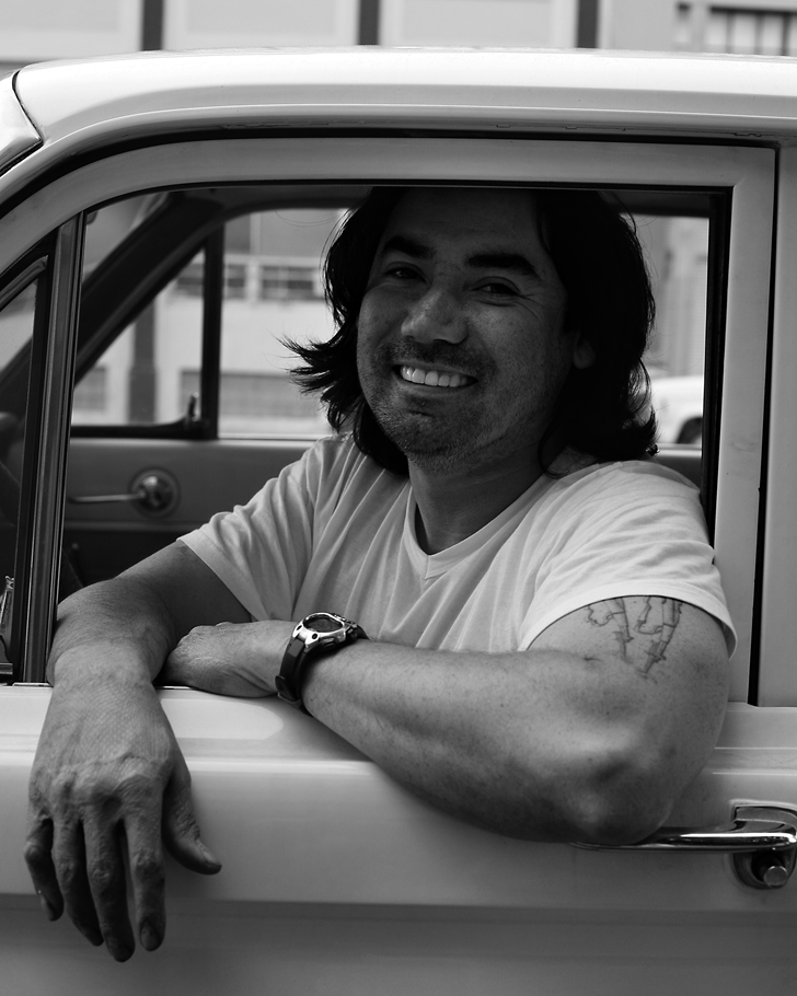 mike smiling in driver's seat of falcon